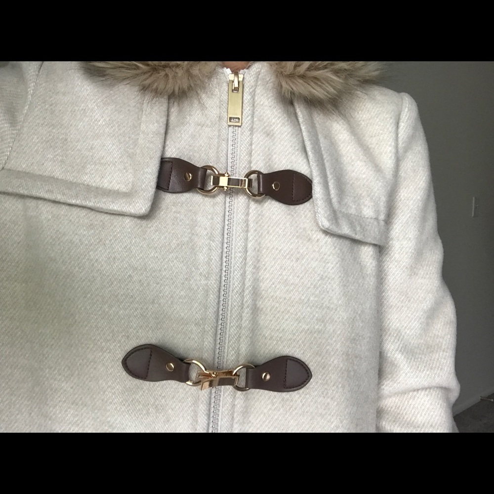 Cream jacket with fur hood